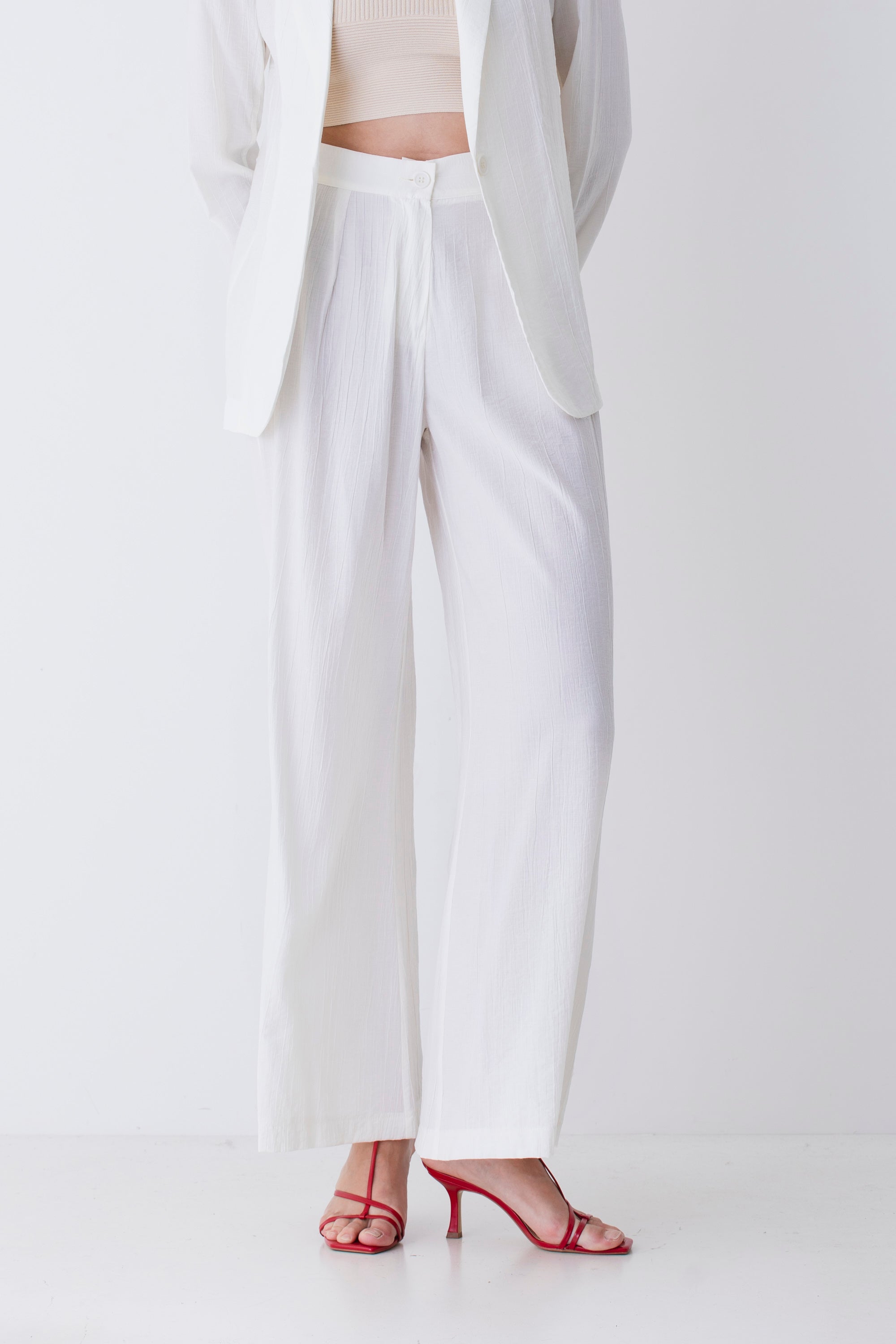 Pantalone palazzo in tessuto goffrato - PE25