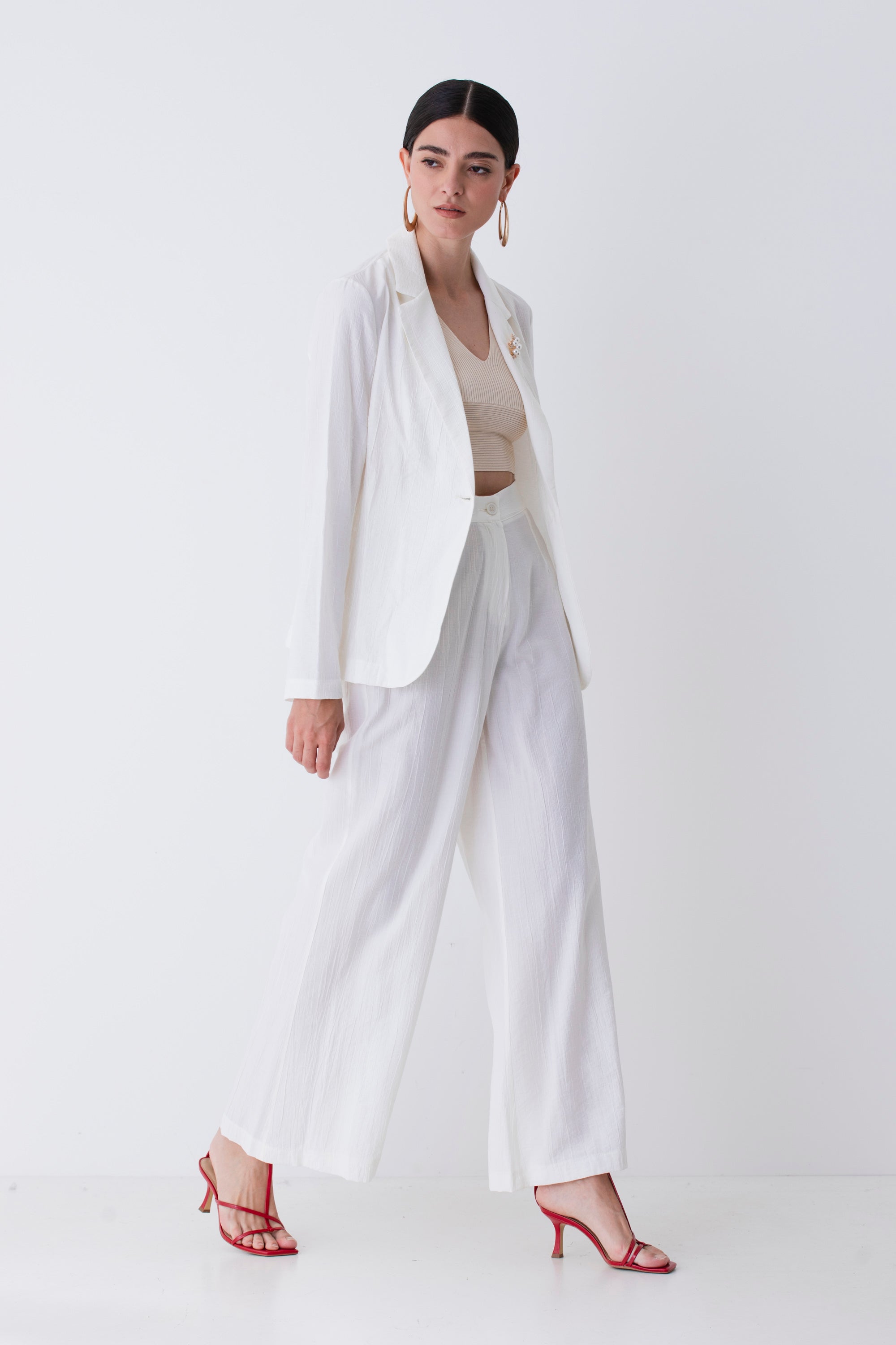 Pantalone palazzo in tessuto goffrato - PE25