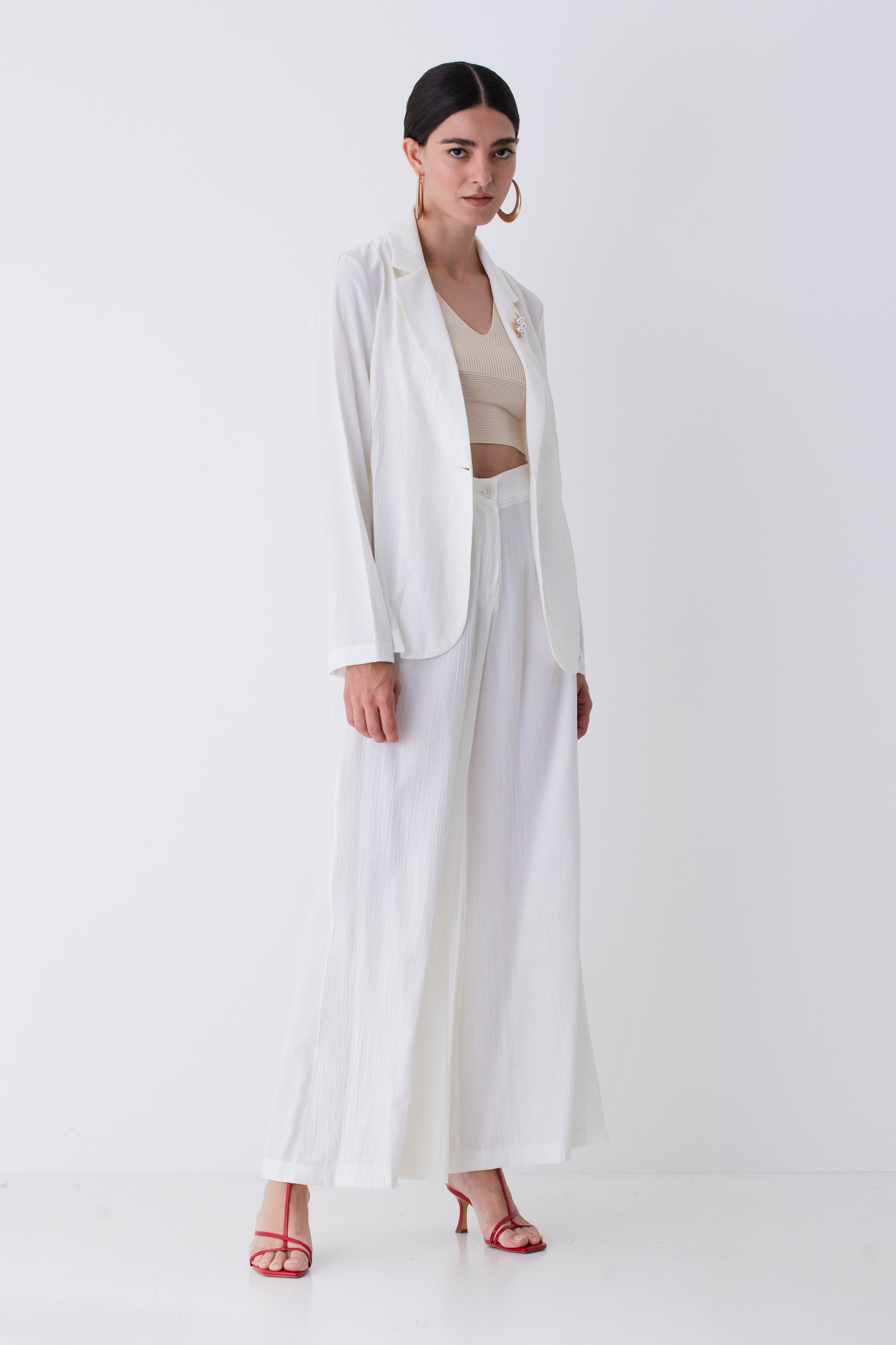 Pantalone palazzo in tessuto goffrato - PE25