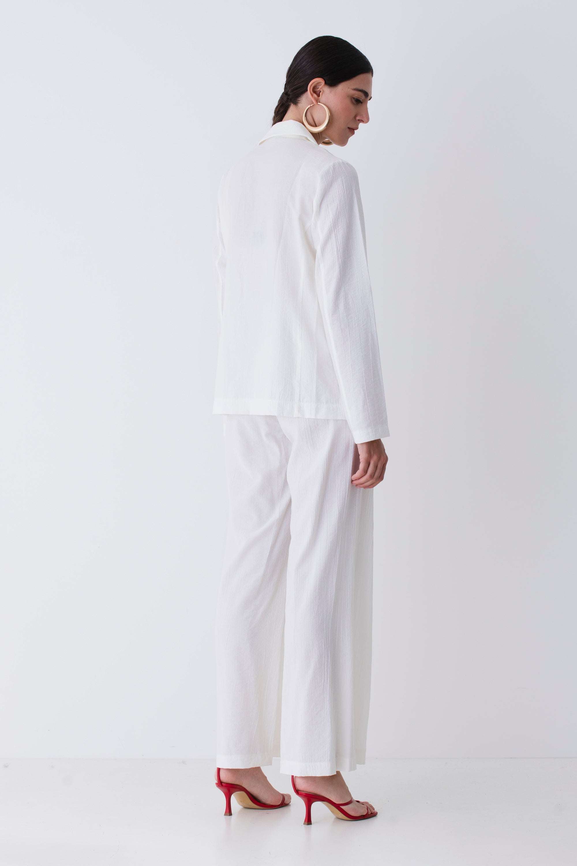 Pantalone palazzo in tessuto goffrato - PE25