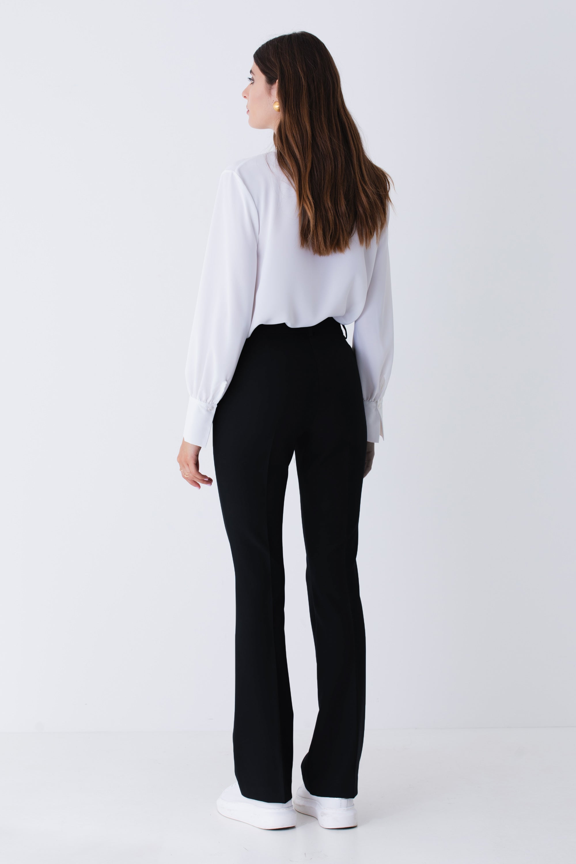 Pantalone a zampa in tessuto tecnico elasticizzato - FW25