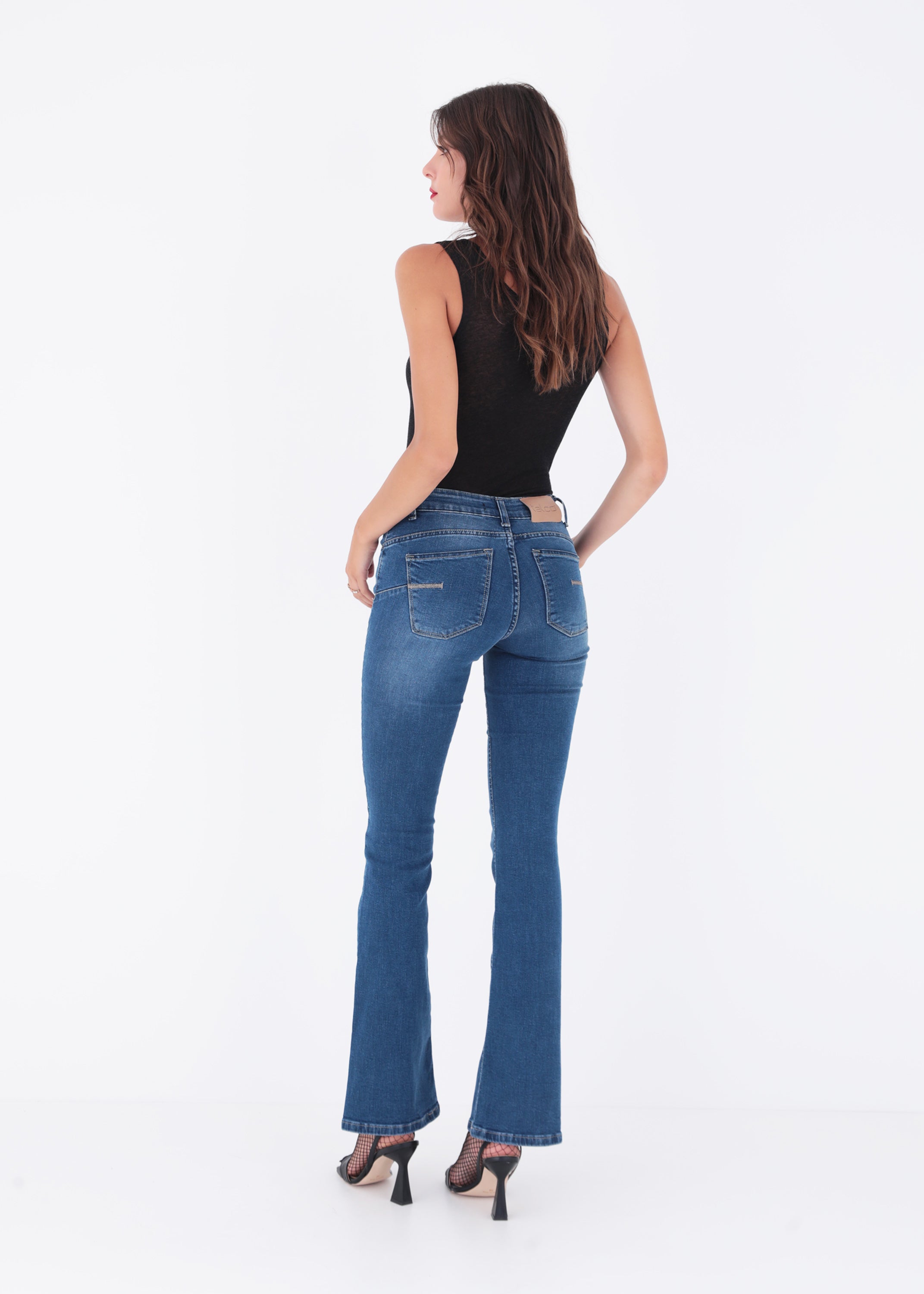 Jeans a zampa in cotone elasticizzato - FW23